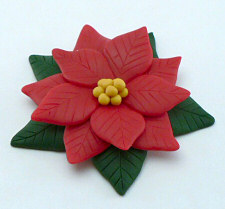 polymer clay poinsettia by planetjune