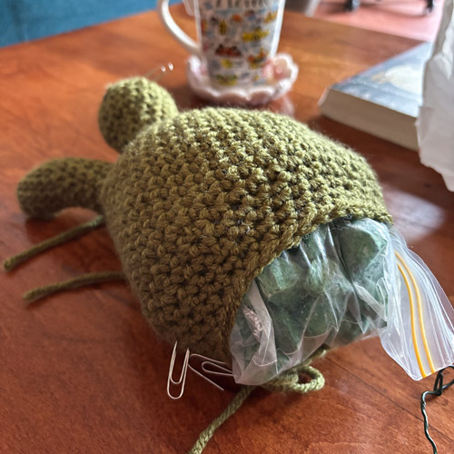 Anna's Tortoise Door Stopper, made from the PlanetJune Tortoise crochet pattern